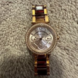 Michael Kors watch - rose gold and burgundy band.